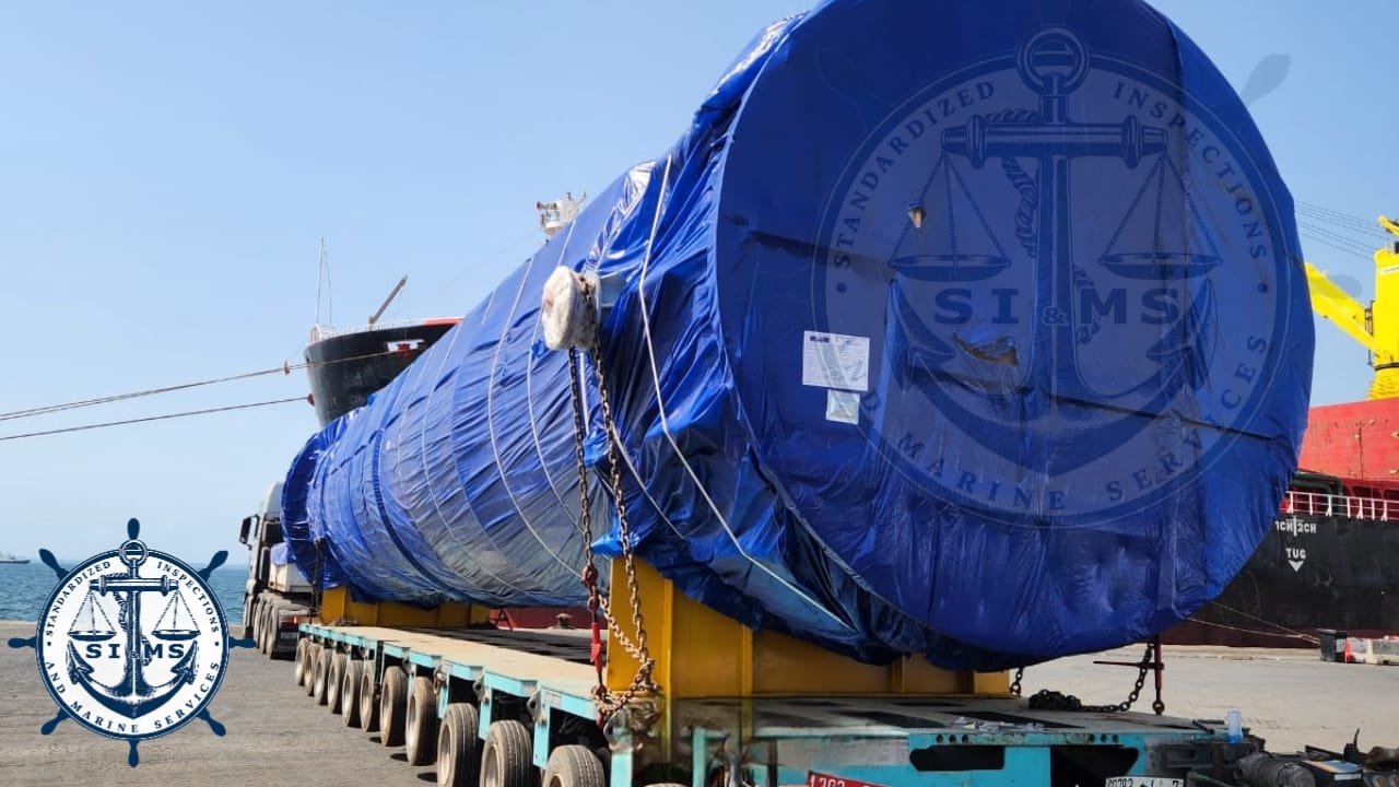 Wrapped pressure vessel staged on the quay before loading