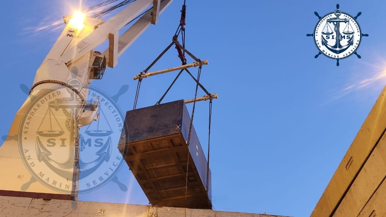 Crated cargo swung over the hatch coaming